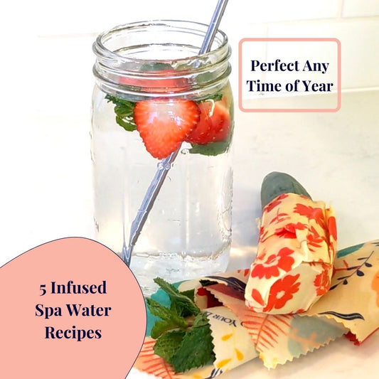 Strawberry and mint infused water with cucumber and herbs in beeswax wraps